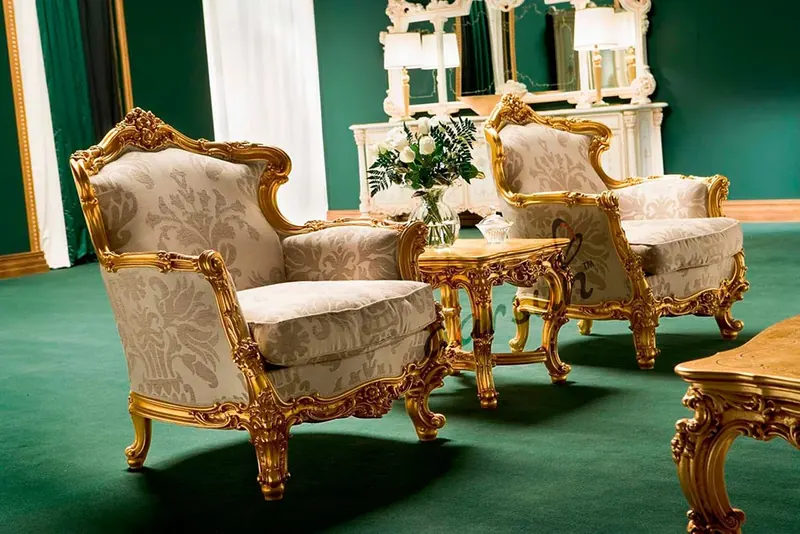 Gold-carved royal armchairs